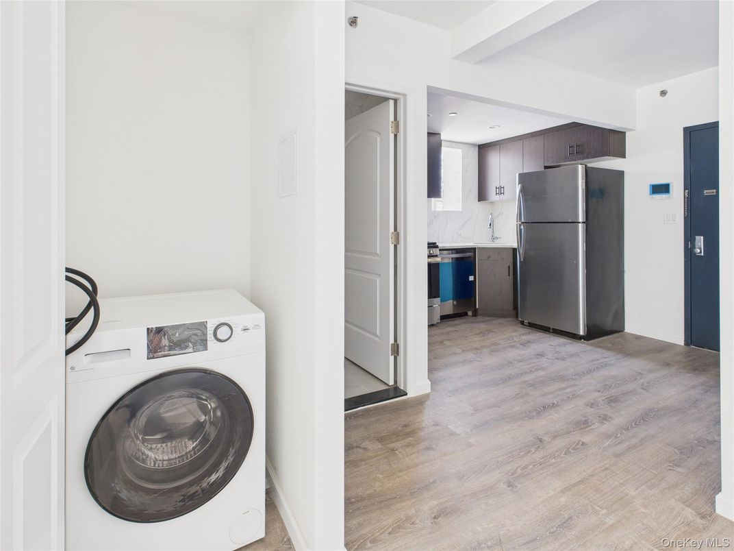 Interior, Kitchen, Recessed Lighting, Utility Closets, Washer, Wood Texture Flooring