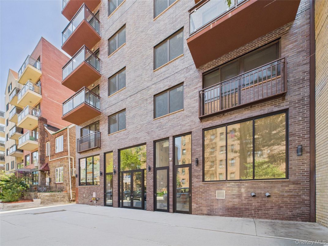 Exterior, Facade, Brick Facade, Condo Building