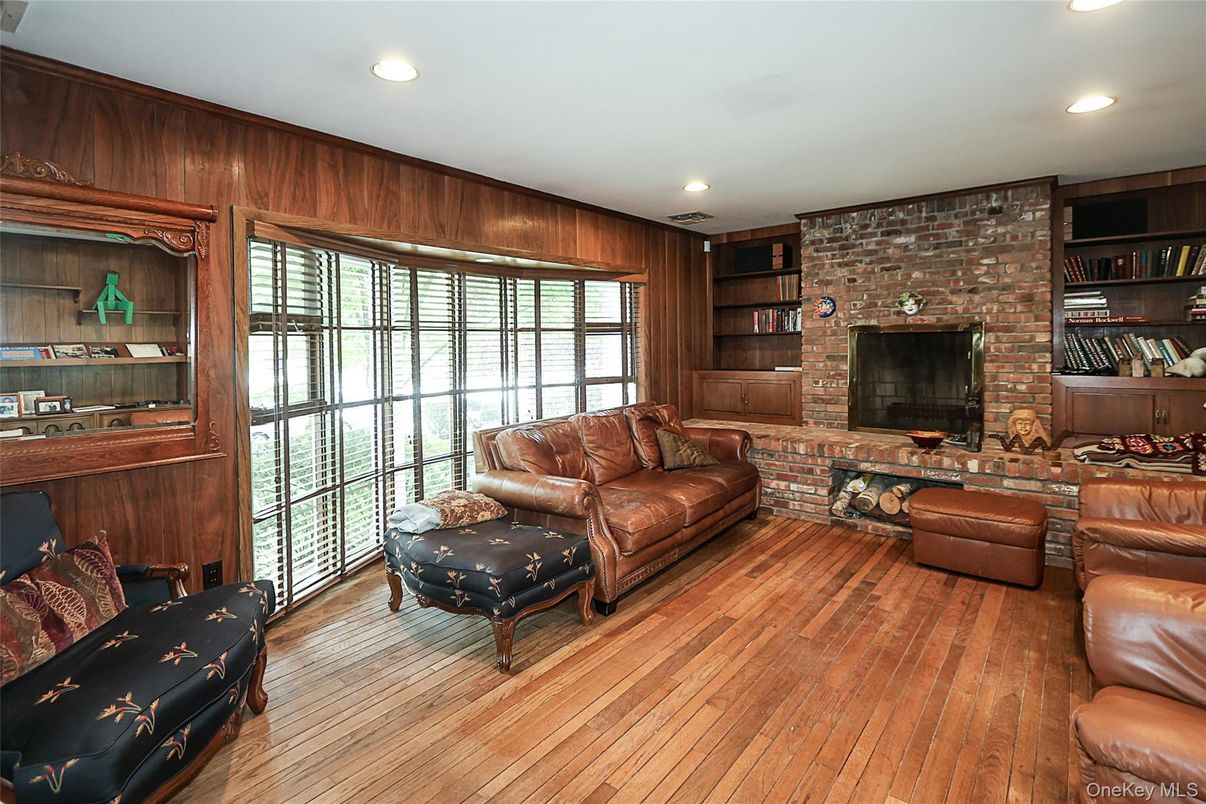 Fireplace, Interior, Living room, Recessed Lighting, Stone Walls, Wood Texture Flooring, Wooden Walls