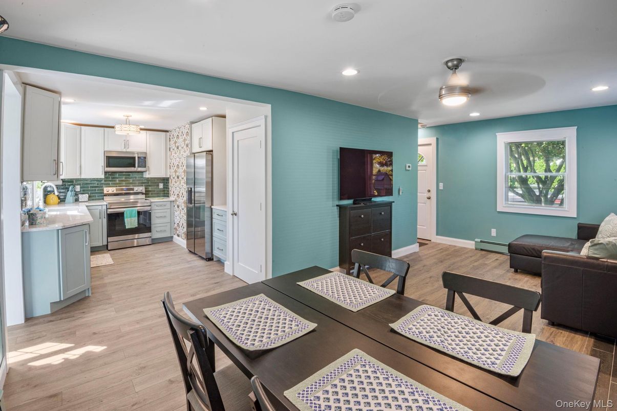 Dining room, Interior, Kitchen, Recessed Lighting, Stainless Steel Appliances, Wood Texture Flooring