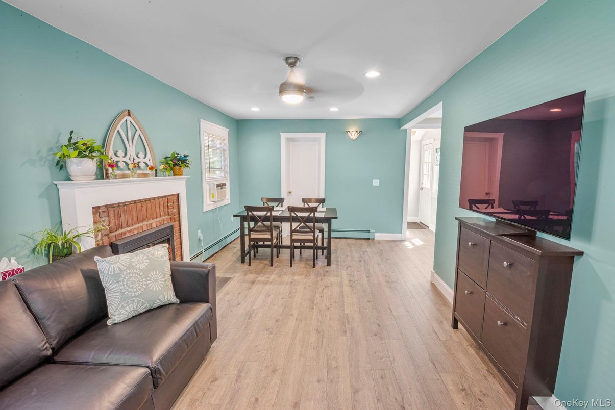 Dining room, Fireplace, Interior, Recessed Lighting, Wood Texture Flooring