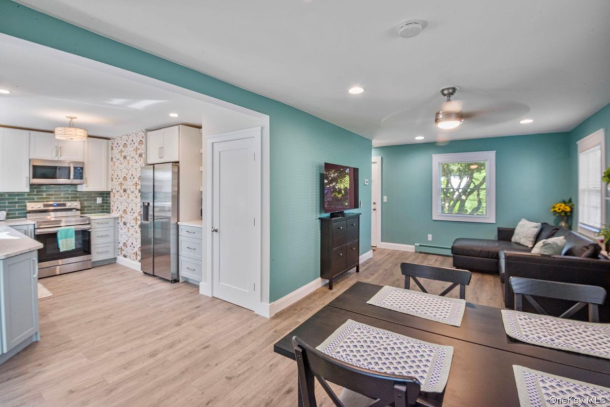Dining room, Interior, Kitchen, Living room, Recessed Lighting, Stainless Steel Appliances, Wood Texture Flooring