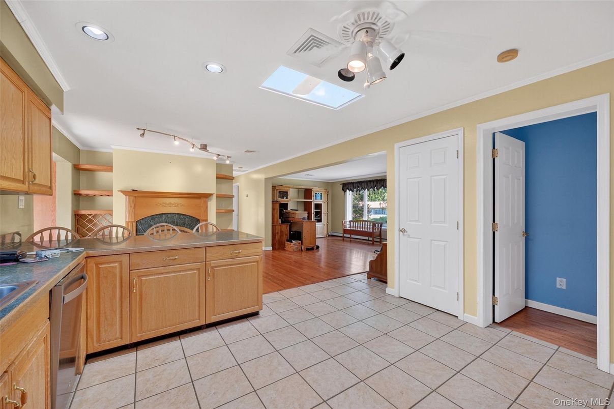 Fireplace, Interior, Kitchen, Recessed Lighting, Wood Texture Flooring