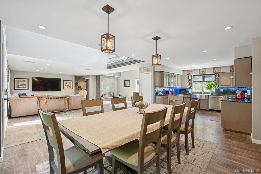 Dining room, Interior, Kitchen, Living room, Pendant Lights, Recessed Lighting, Stainless Steel Appliances, Wood Texture Flooring