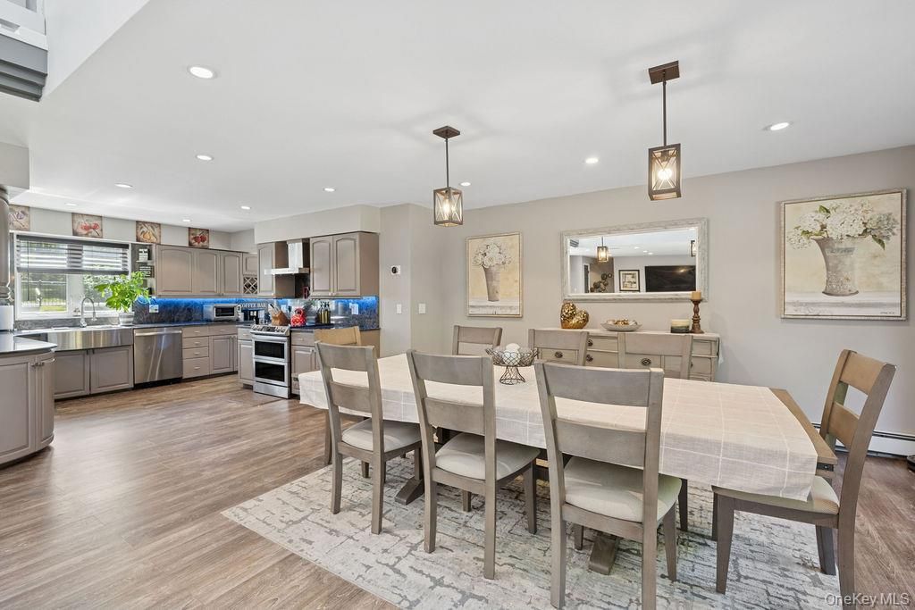 Dining room, Interior, Kitchen, Pendant Lights, Recessed Lighting, Stainless Steel Appliances, Wood Texture Flooring