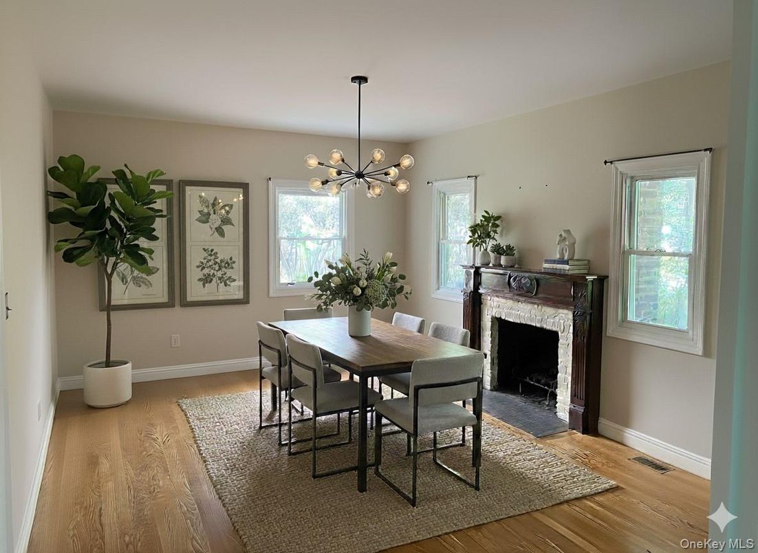 Dining room, Fireplace, Interior, Pendant Lights, Wood Texture Flooring