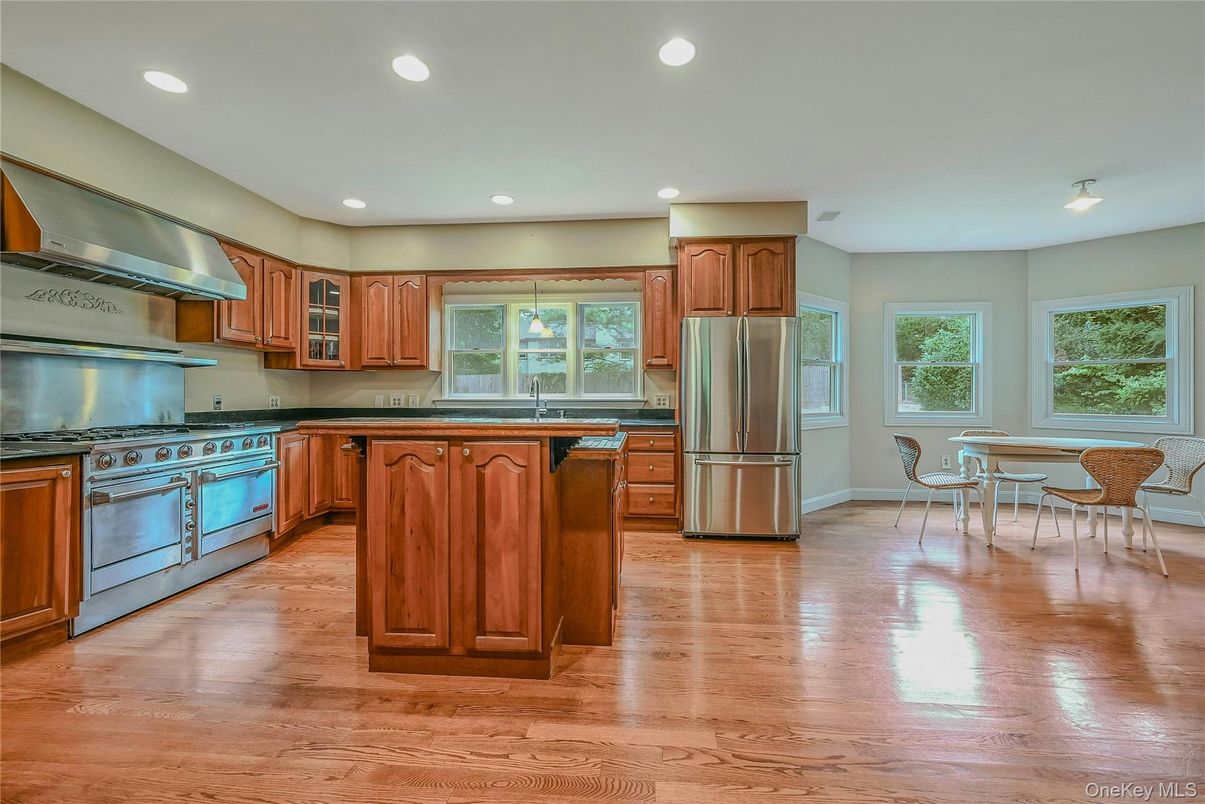 Dining room, Interior, Kitchen, Recessed Lighting, Stainless Steel Appliances, Wood Texture Flooring