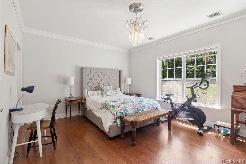 Bedroom, Chandelier, Fitness Equipment, Interior, Wood Texture Flooring