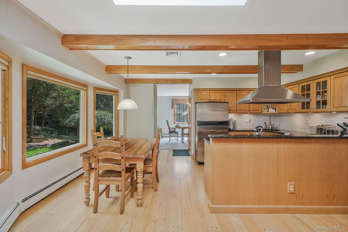 Dining room, Interior, Kitchen, Pendant Lights, Recessed Lighting, Stainless Steel Appliances, Wooden Beams, Wood Texture Flooring