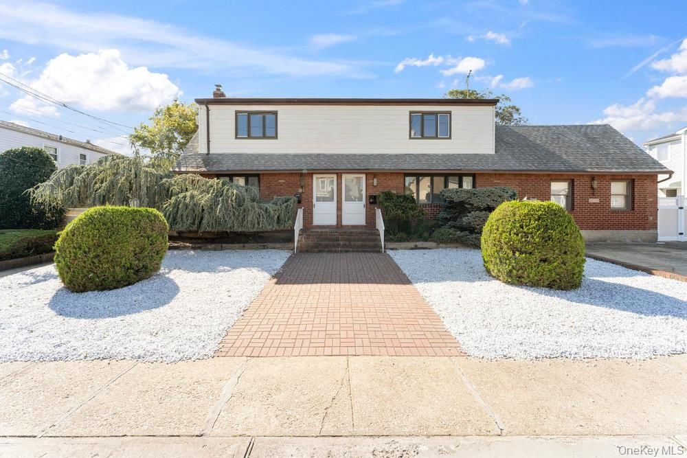 Exterior, Facade, Brick Facade, Cape Cod