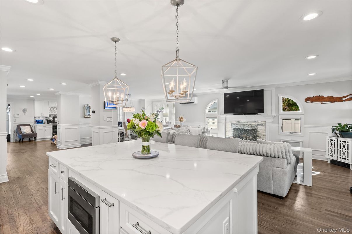 Dining room, Fireplace, Interior, Kitchen, Living room, Pendant Lights, Recessed Lighting, Wood Texture Flooring