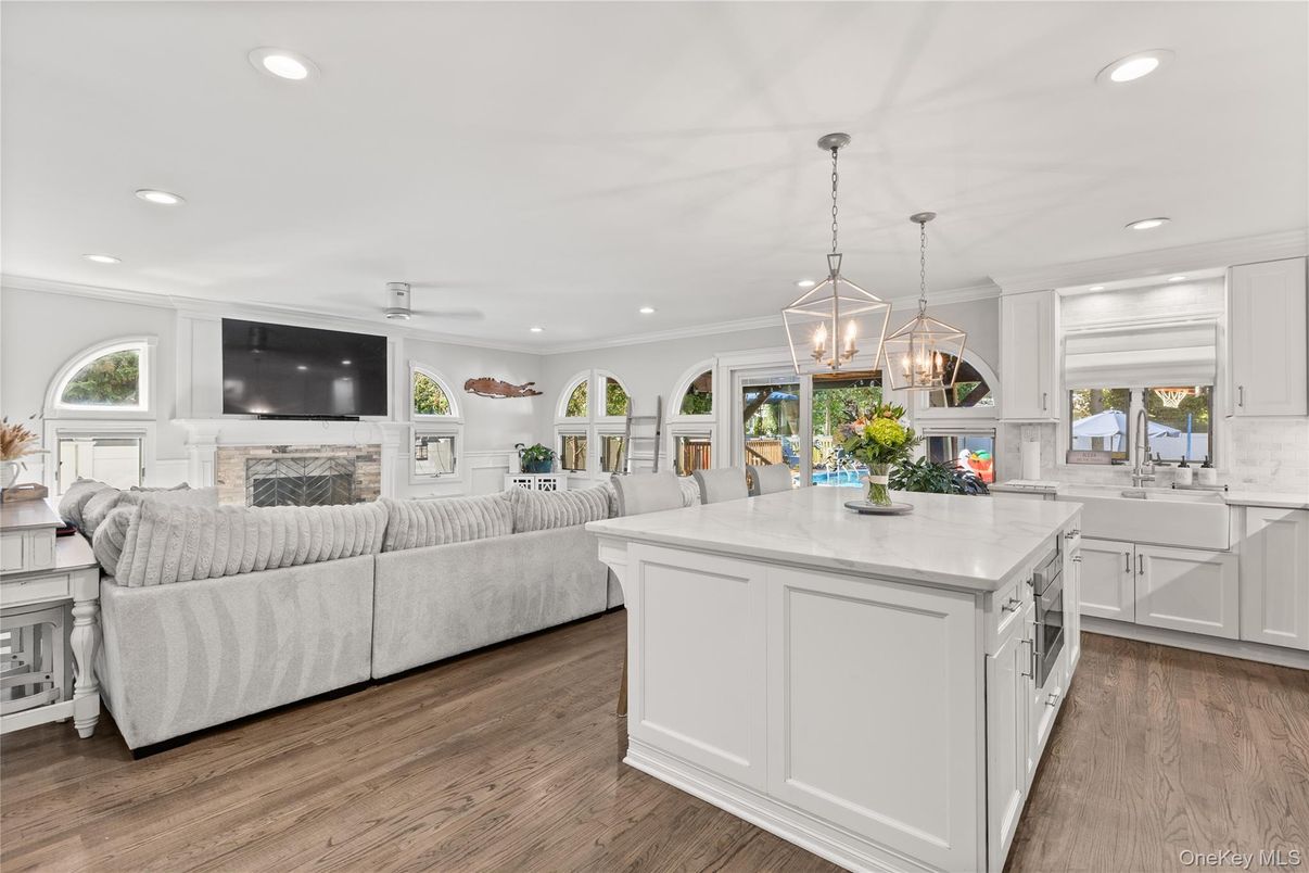 Dining room, Fireplace, Interior, Kitchen, Living room, Pendant Lights, Recessed Lighting, Wood Texture Flooring