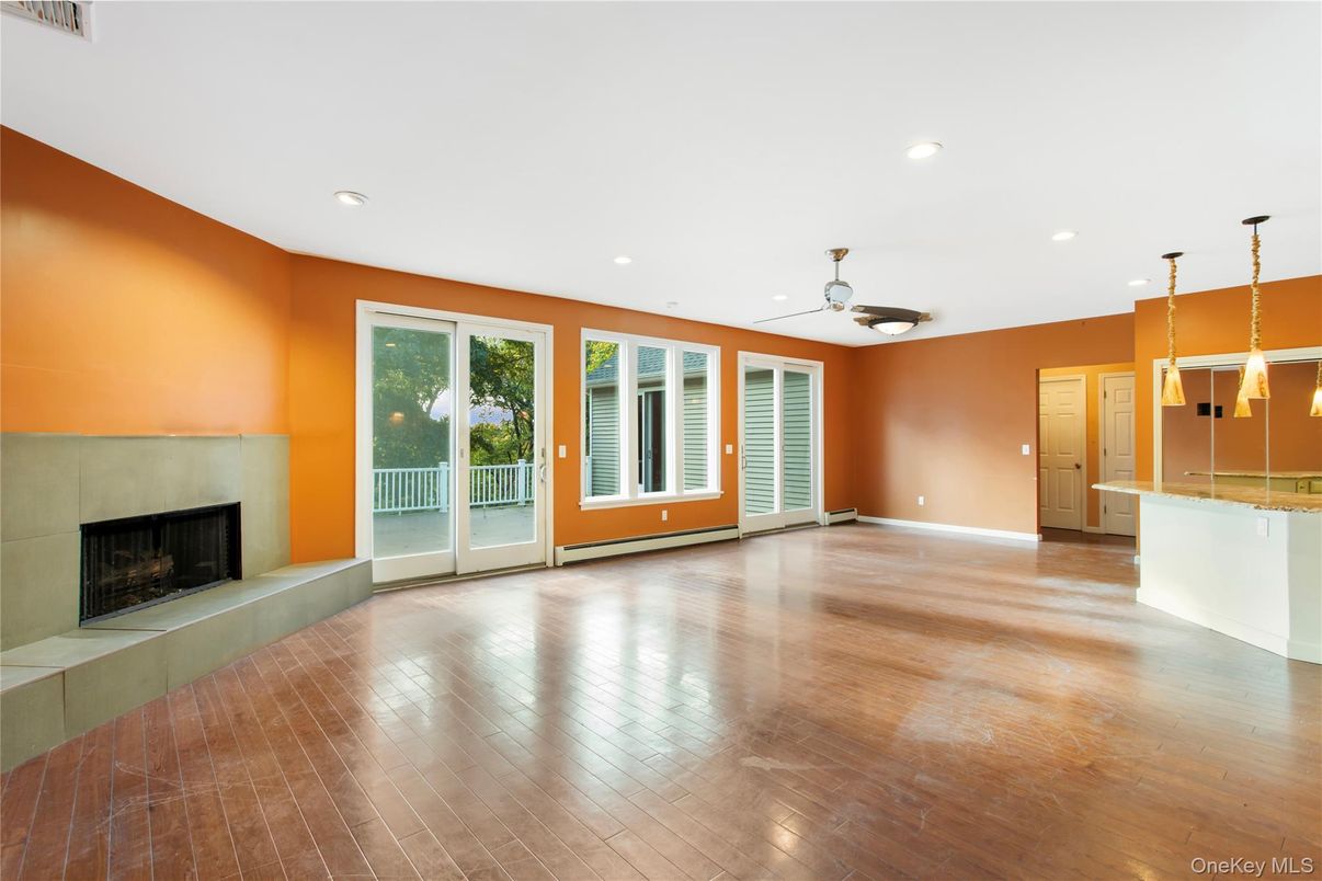 Empty room, Fireplace, Interior, Pendant Lights, Recessed Lighting, Wood Texture Flooring