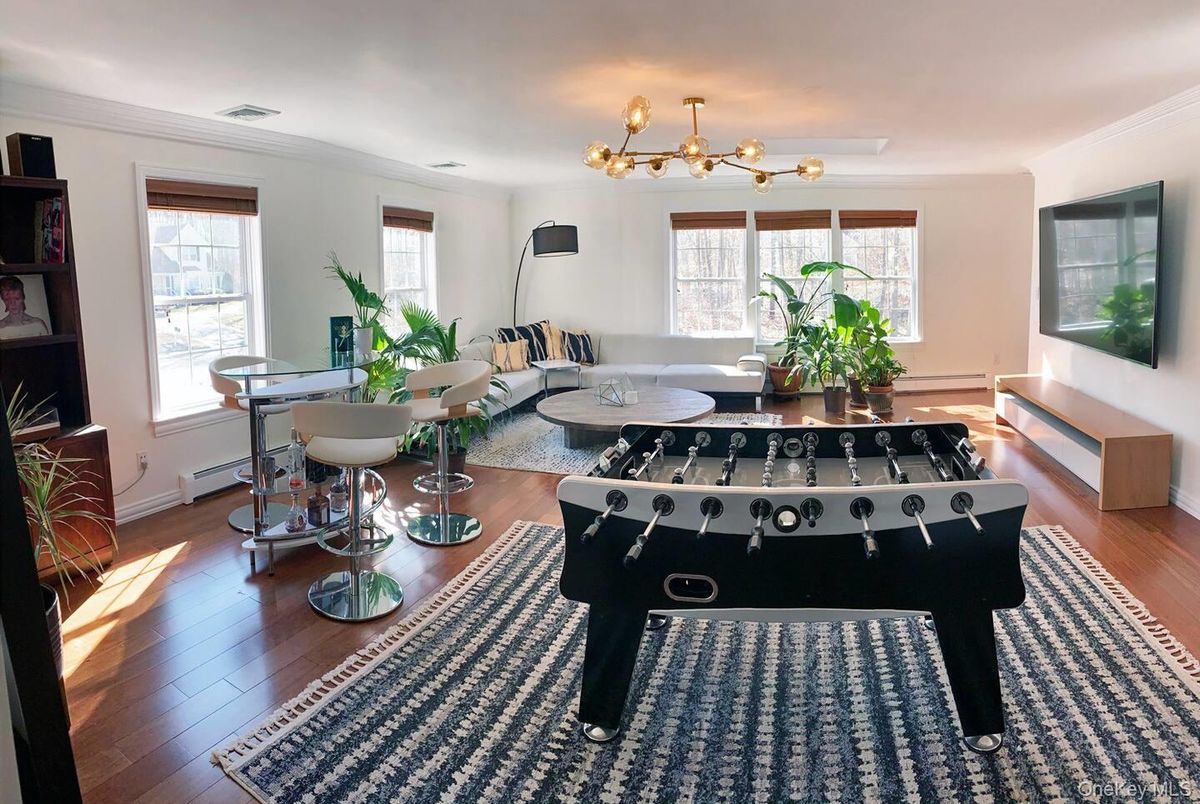 Dining room, Game Room, Interior, Living room, Pendant Lights, Wood Texture Flooring