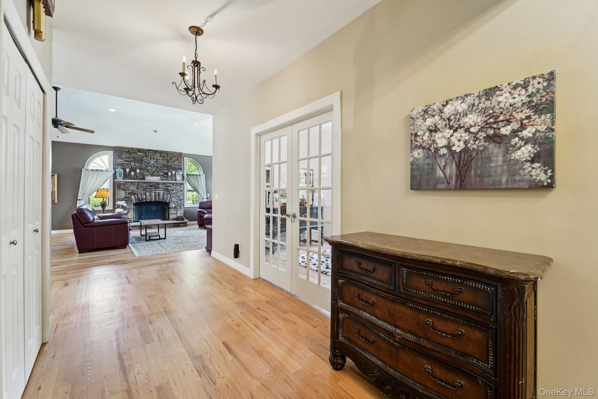 Chandelier, Interior, Living room, Recessed Lighting, Stone Walls, Wood Texture Flooring