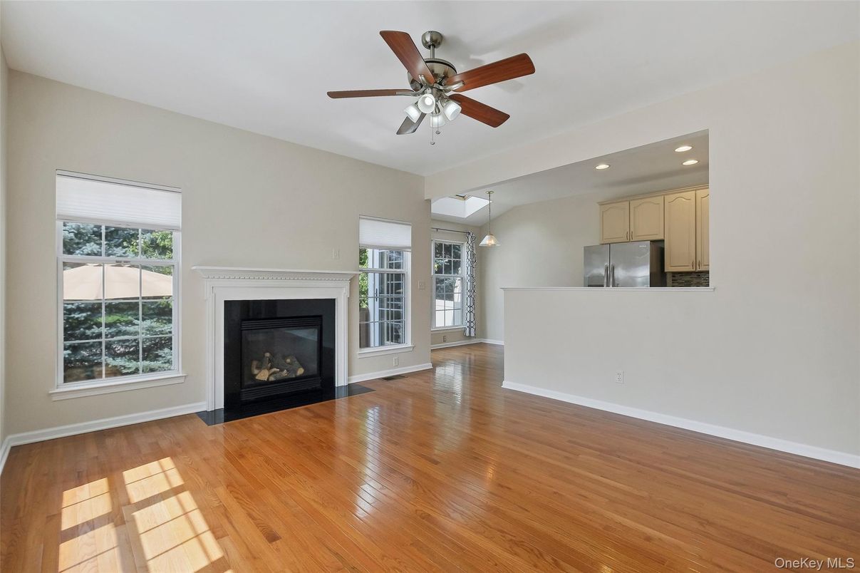 Empty room, Fireplace, Interior, Kitchen, Recessed Lighting, Wood Texture Flooring
