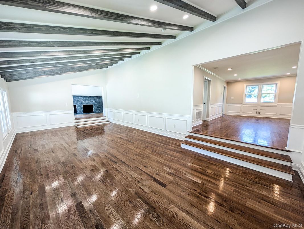 Empty room, Fireplace, Interior, Recessed Lighting, Wooden Beams, Wood Texture Flooring