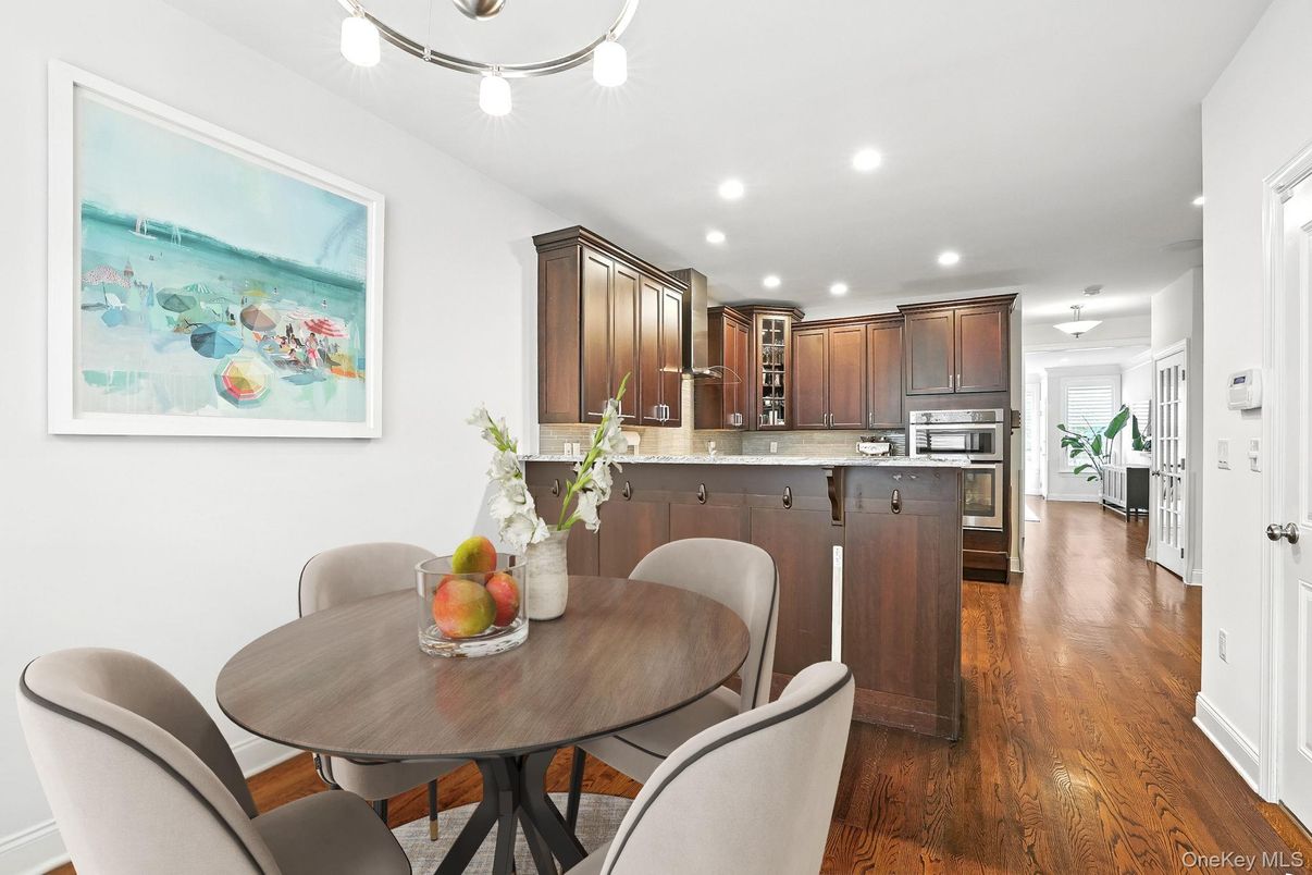 Dining room, Interior, Kitchen, Recessed Lighting, Stainless Steel Appliances, Wood Texture Flooring