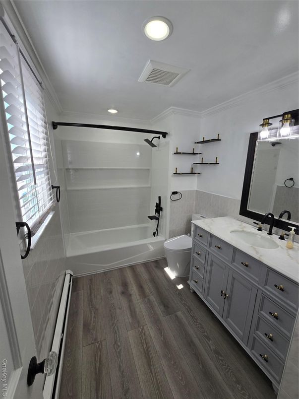 Bathroom, Dual Sink Vanities, Interior, Recessed Lighting, Wood Texture Flooring