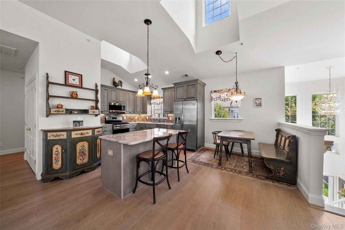 Chandelier, Dining room, Interior, Kitchen, Pendant Lights, Recessed Lighting, Stainless Steel Appliances, Wood Texture Flooring