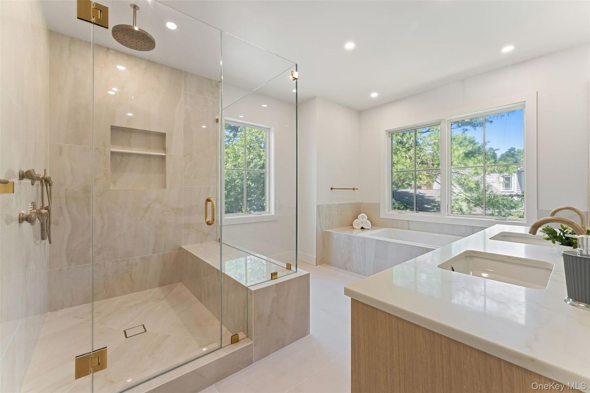 Bathroom, Dual Sink Vanities, Glass Shower, Interior, Marble Walls, Recessed Lighting