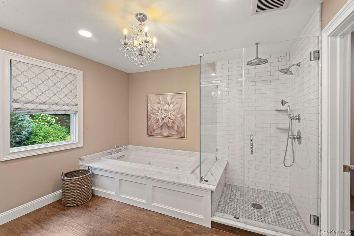 Bathroom, Chandelier, Glass Shower, Interior, Recessed Lighting, Wood Texture Flooring