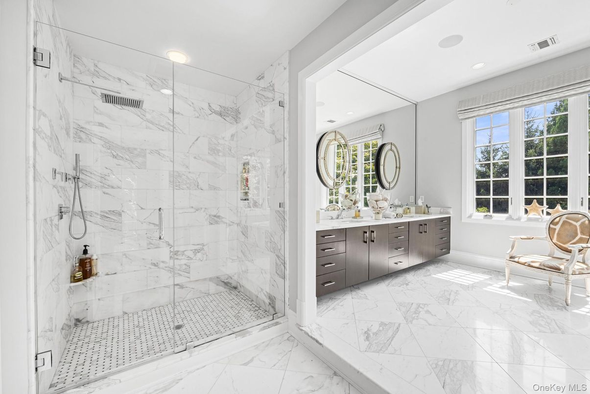 Bathroom, Dual Sink Vanities, Glass Shower, Interior, Marble, Marble Walls, Recessed Lighting