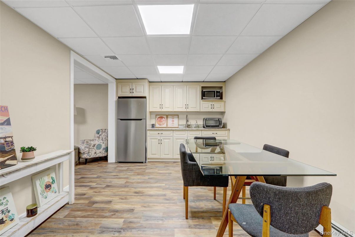 Dining room, Interior, Kitchen, Recessed Lighting, Stainless Steel Appliances, Wood Texture Flooring