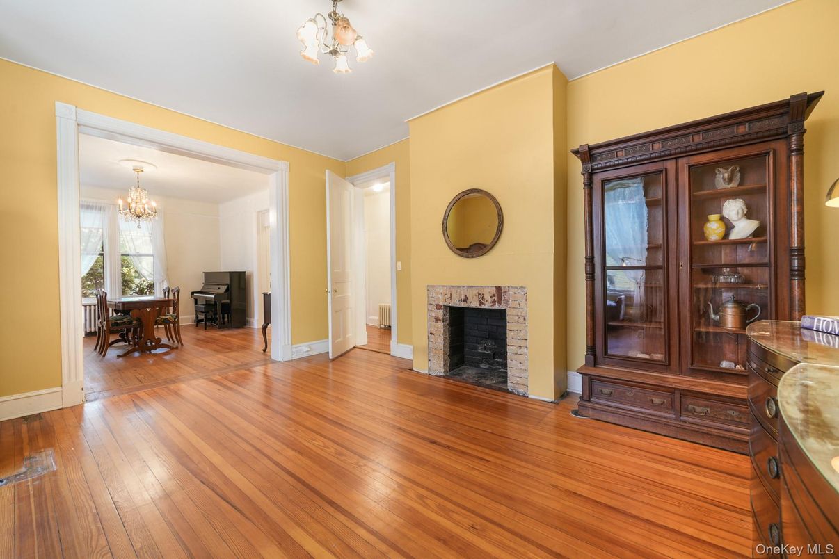 Chandelier, Dining room, Fireplace, Interior, Wood Texture Flooring
