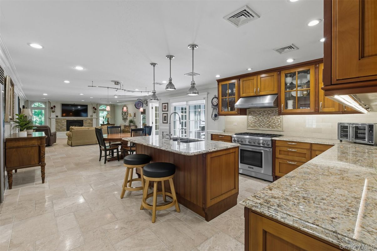 Dining room, Fireplace, Interior, Kitchen, Pendant Lights, Recessed Lighting, Stainless Steel Appliances
