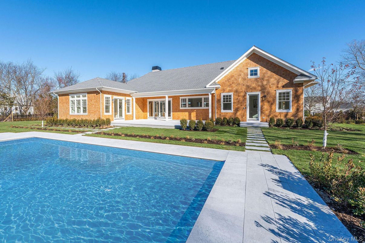 Exterior, Facade, Brick Facade, Pool, Brick Traditional