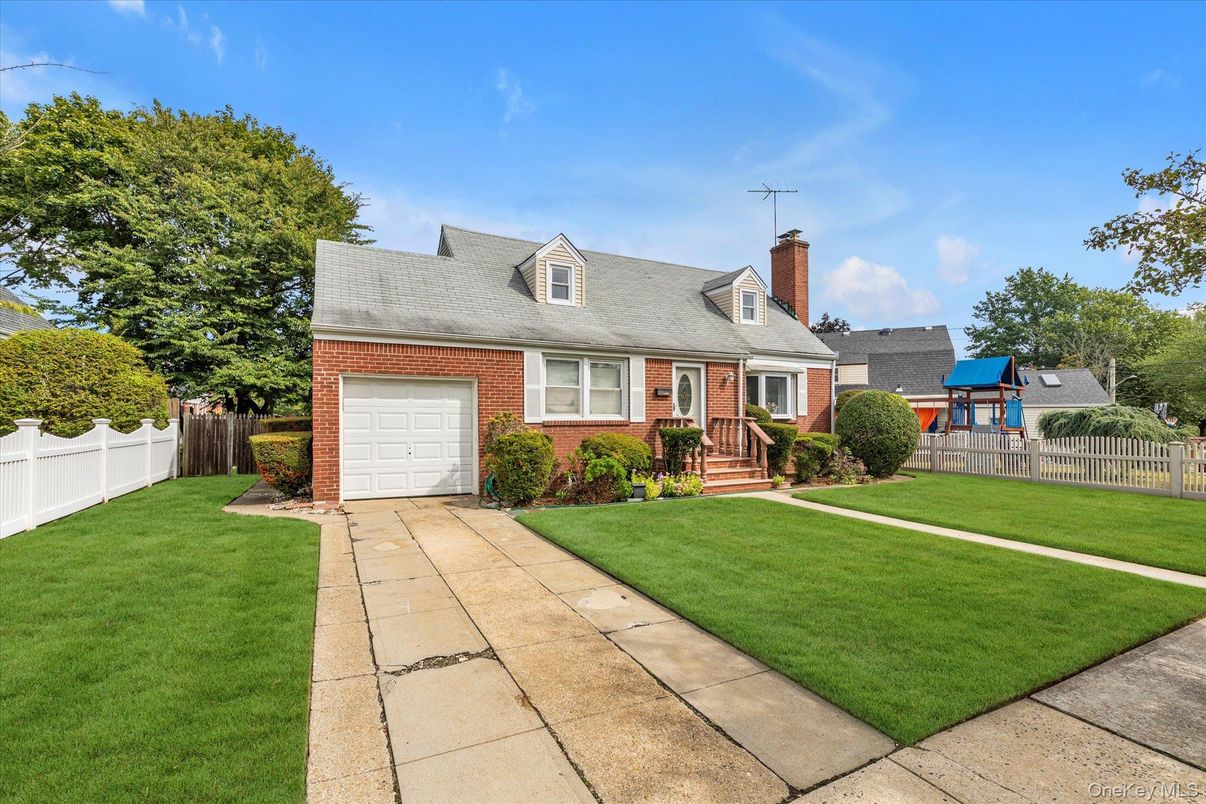 Attached, Exterior, Facade, Brick Facade, Cape Cod