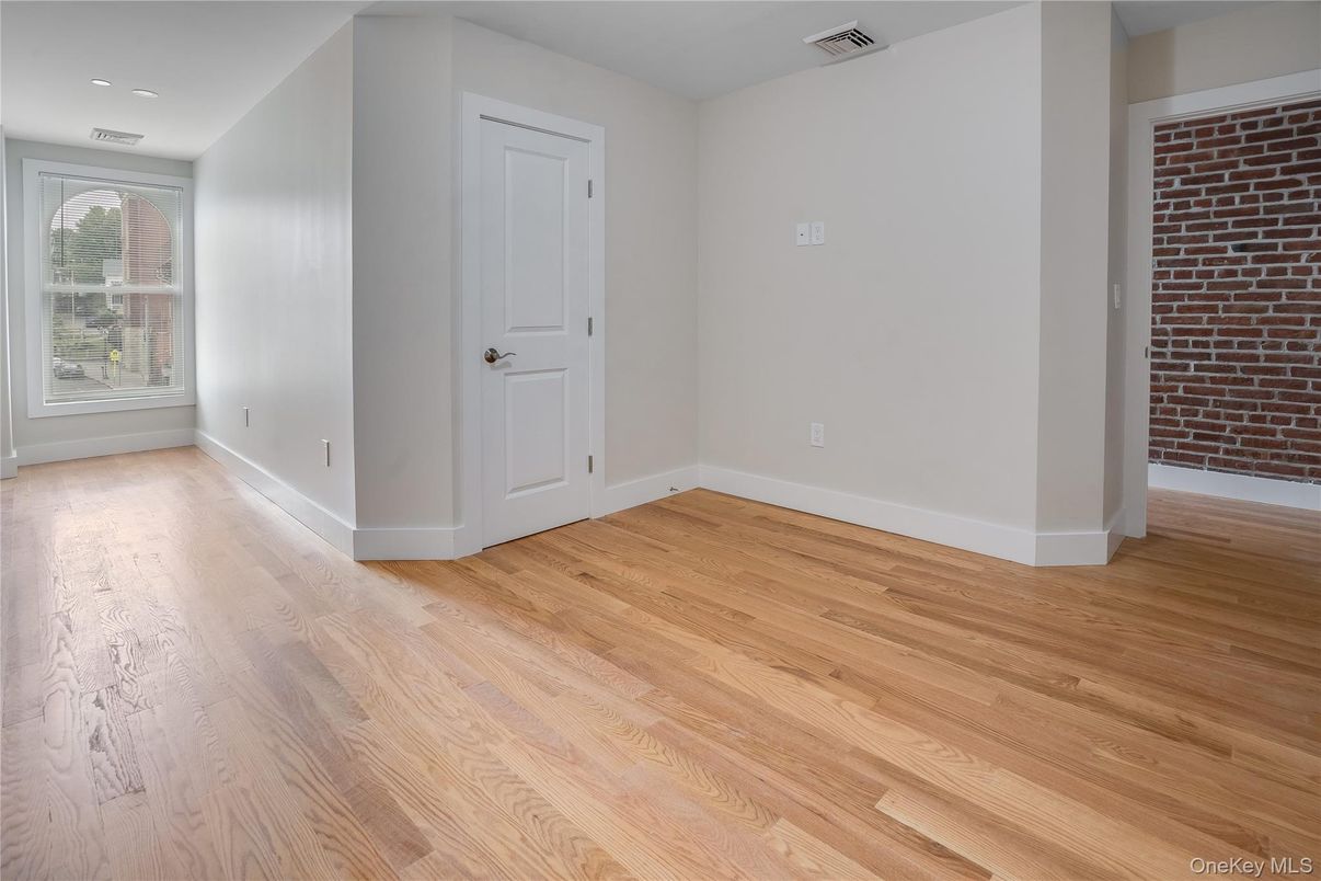 Empty room, Interior, Recessed Lighting, Stone Walls, Wood Texture Flooring