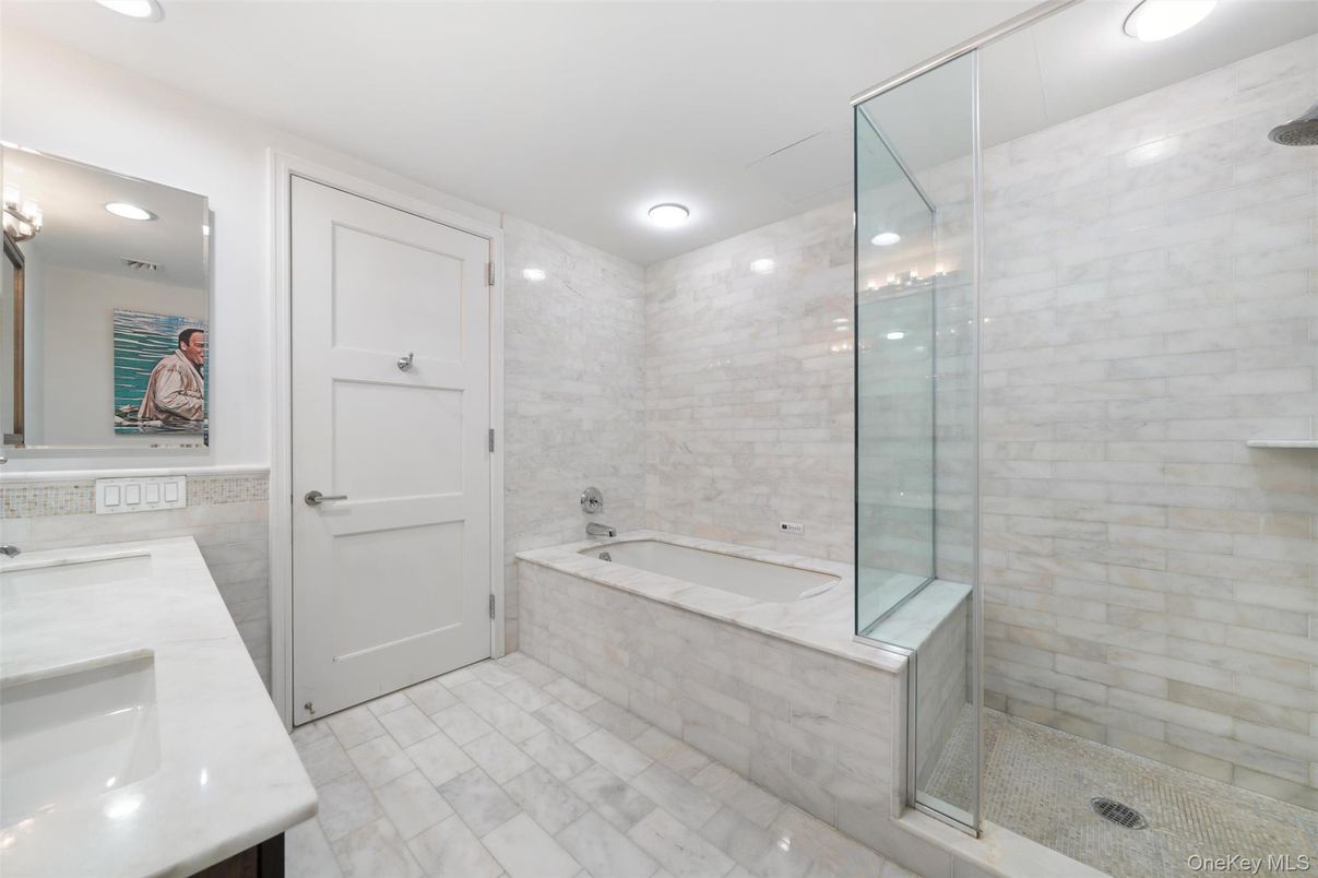 Bathroom, Dual Sink Vanities, Glass Shower, Interior, Marble Walls, Recessed Lighting