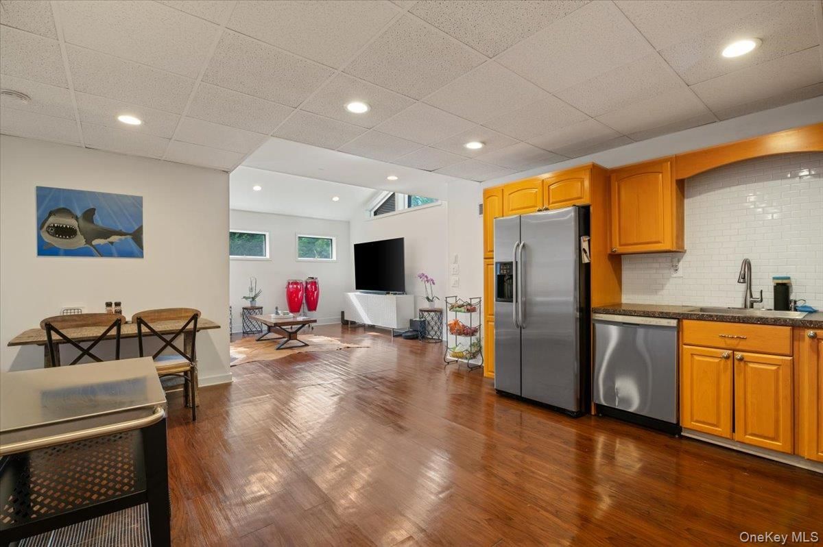 Dining room, Interior, Kitchen, Recessed Lighting, Stainless Steel Appliances, Wood Texture Flooring