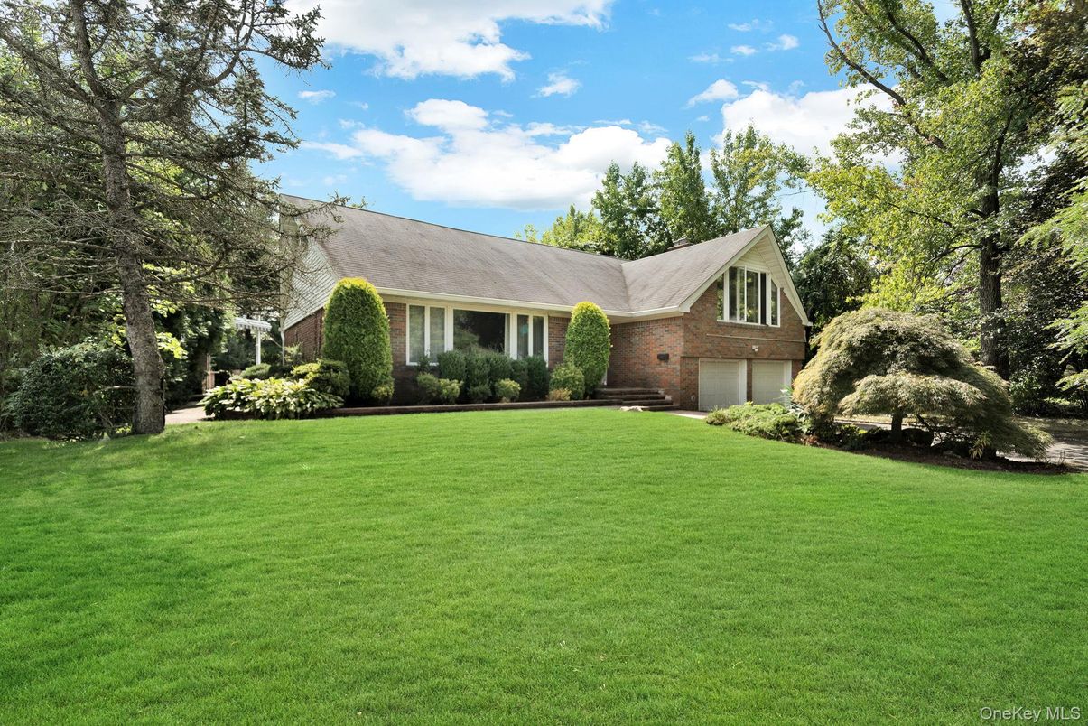Attached, Backyard, Exterior, Facade, Brick Facade, Cape Cod