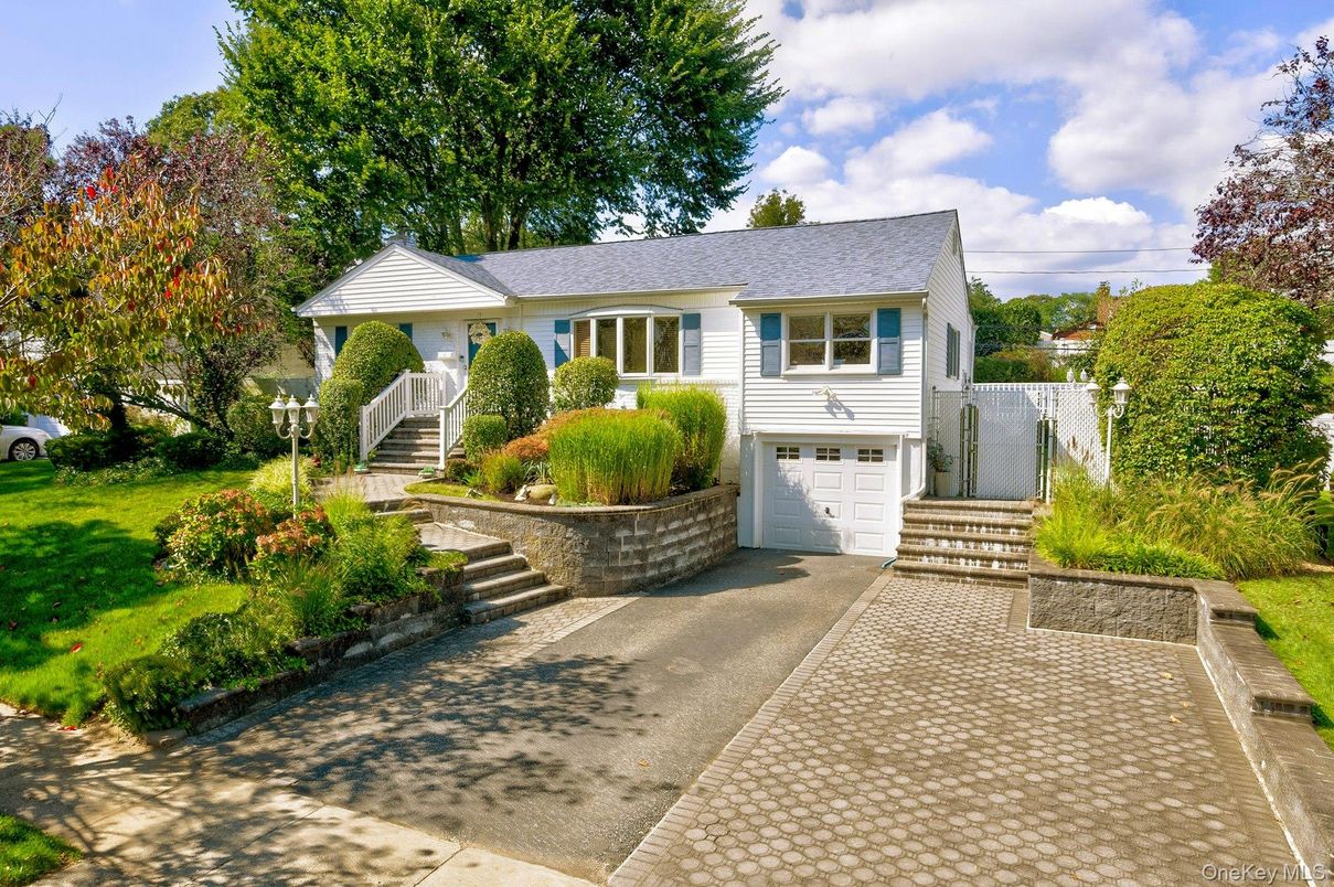 Attached, Exterior, Facade, Raised Ranch