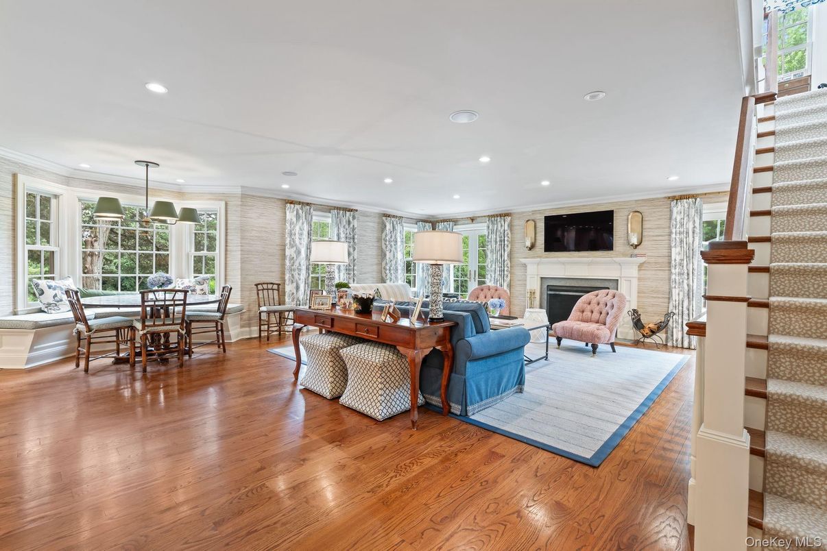 Dining room, Fireplace, Interior, Living room, Pendant Lights, Recessed Lighting, Stone Walls, Wood Texture Flooring