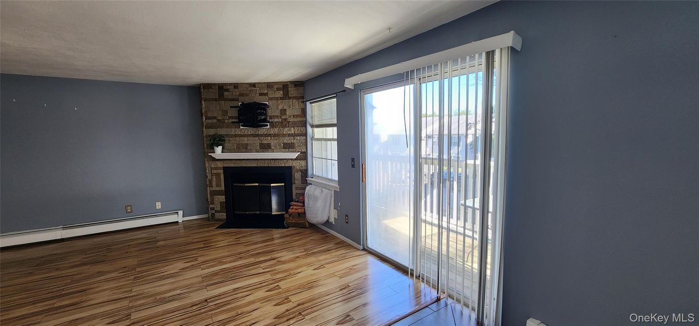 Empty room, Fireplace, Interior, Stone Walls, Wood Texture Flooring