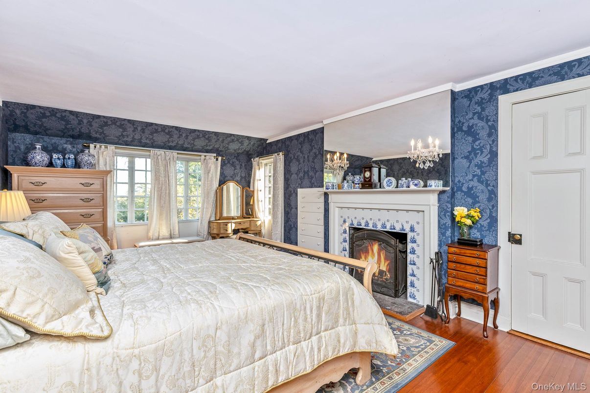 Bedroom, Chandelier, Fireplace, Interior, Wood Texture Flooring