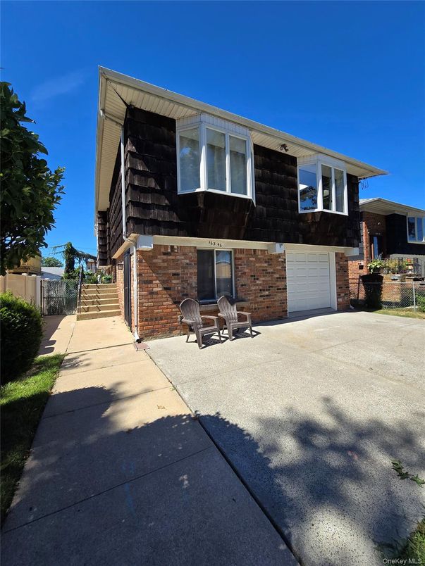 Attached, Exterior, Facade, Brick Facade, Raised Ranch