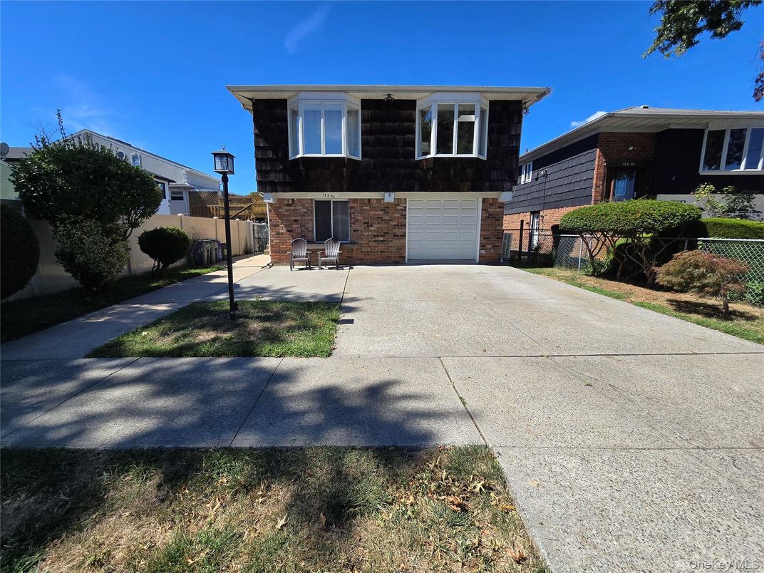 Attached, Exterior, Facade, Brick Facade, Raised Ranch