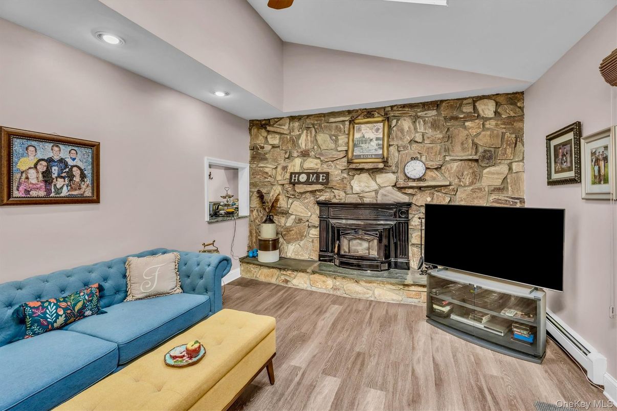 Fireplace, Interior, Recessed Lighting, Stone Walls, Wood Texture Flooring