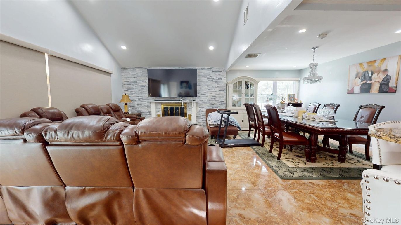Dining room, Fireplace, Interior, Living room, Recessed Lighting, Stone Walls