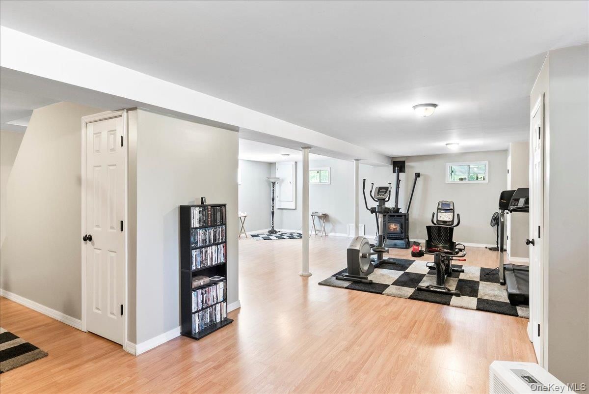 Fireplace, Fitness Equipment, Interior, Wood Texture Flooring