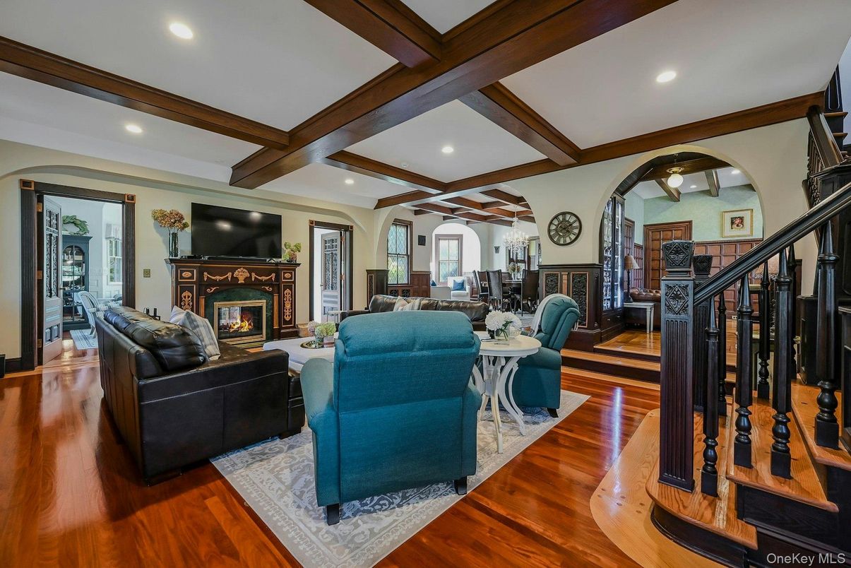 Dining room, Fireplace, Interior, Living room, Recessed Lighting, Wooden Beams, Wood Texture Flooring