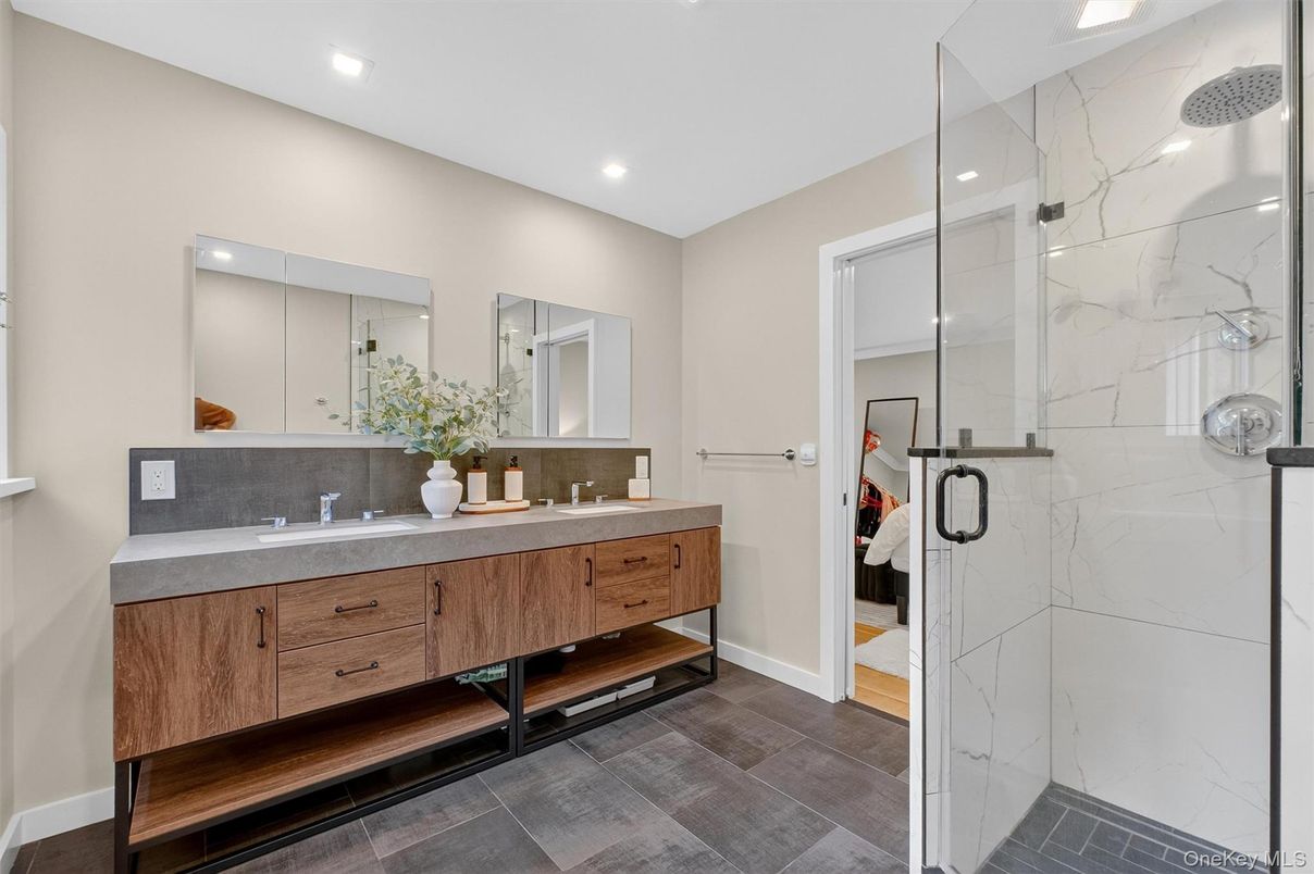 Bathroom, Dual Sink Vanities, Glass Shower, Interior, Marble Walls, Recessed Lighting