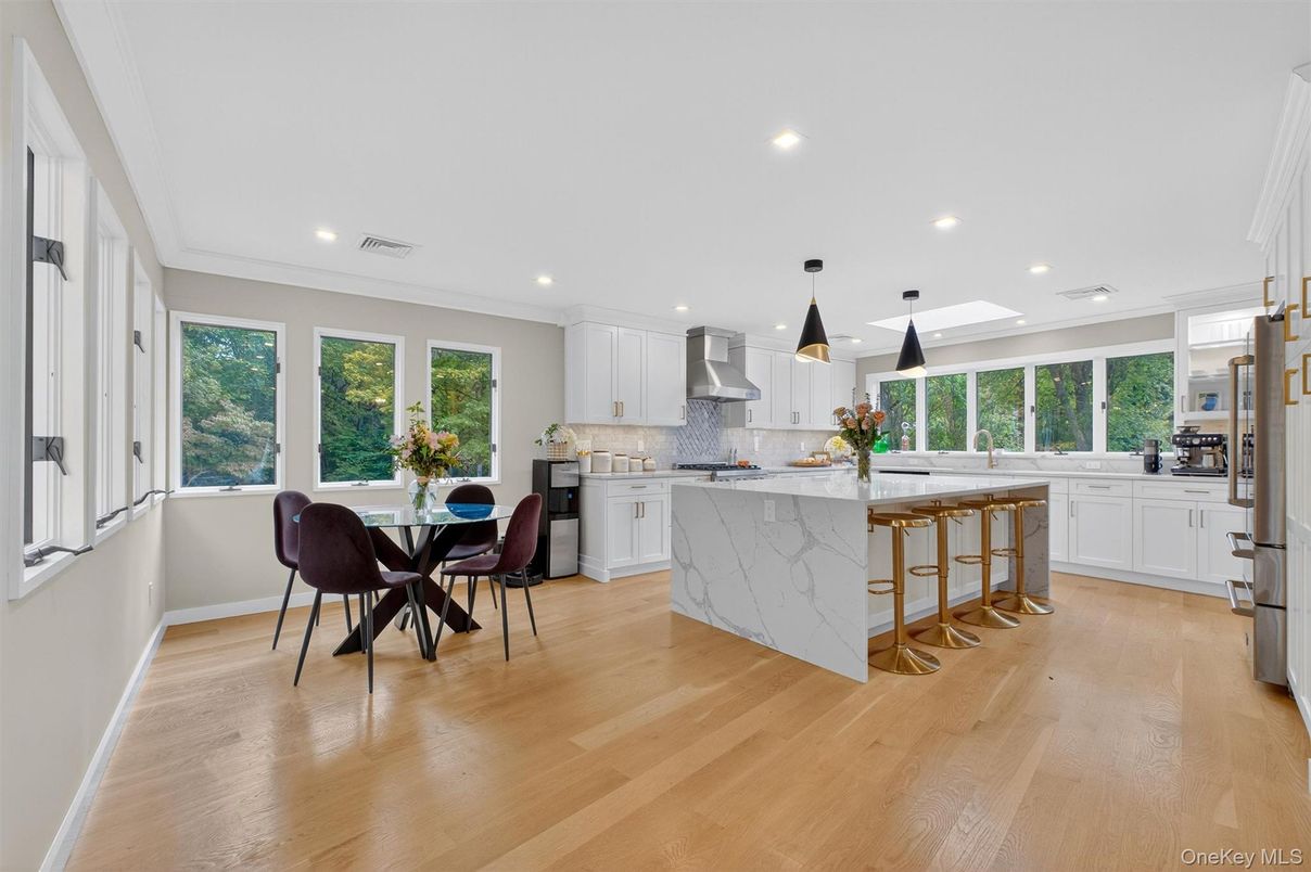 Dining room, Interior, Kitchen, Pendant Lights, Recessed Lighting, Stainless Steel Appliances, Wood Texture Flooring