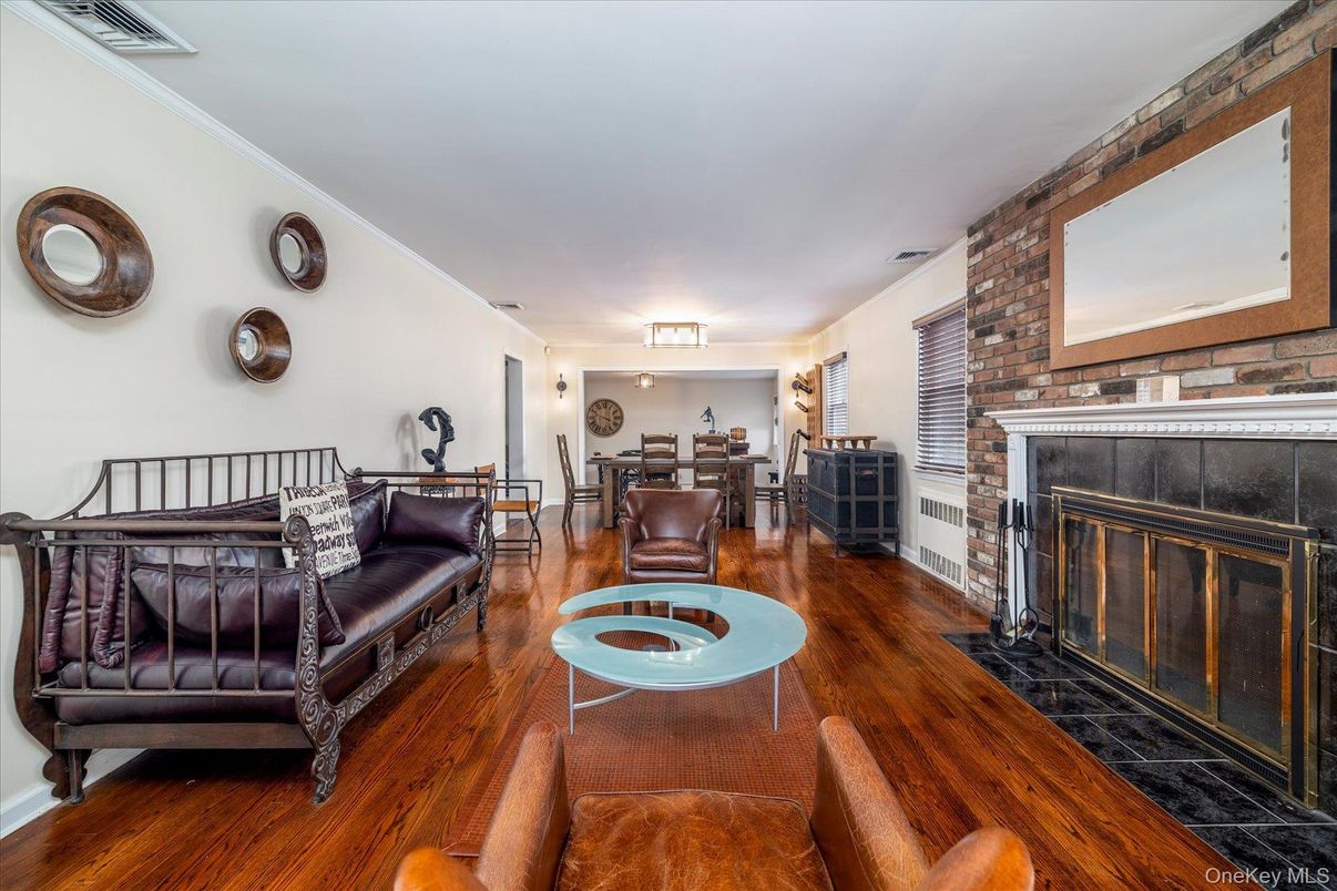 Dining room, Fireplace, Interior, Living room, Stone Walls, Wood Texture Flooring