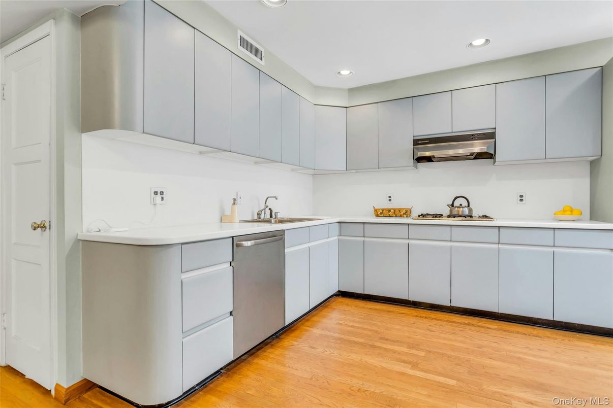 Interior, Kitchen, Recessed Lighting, Stainless Steel Appliances, Wood Texture Flooring